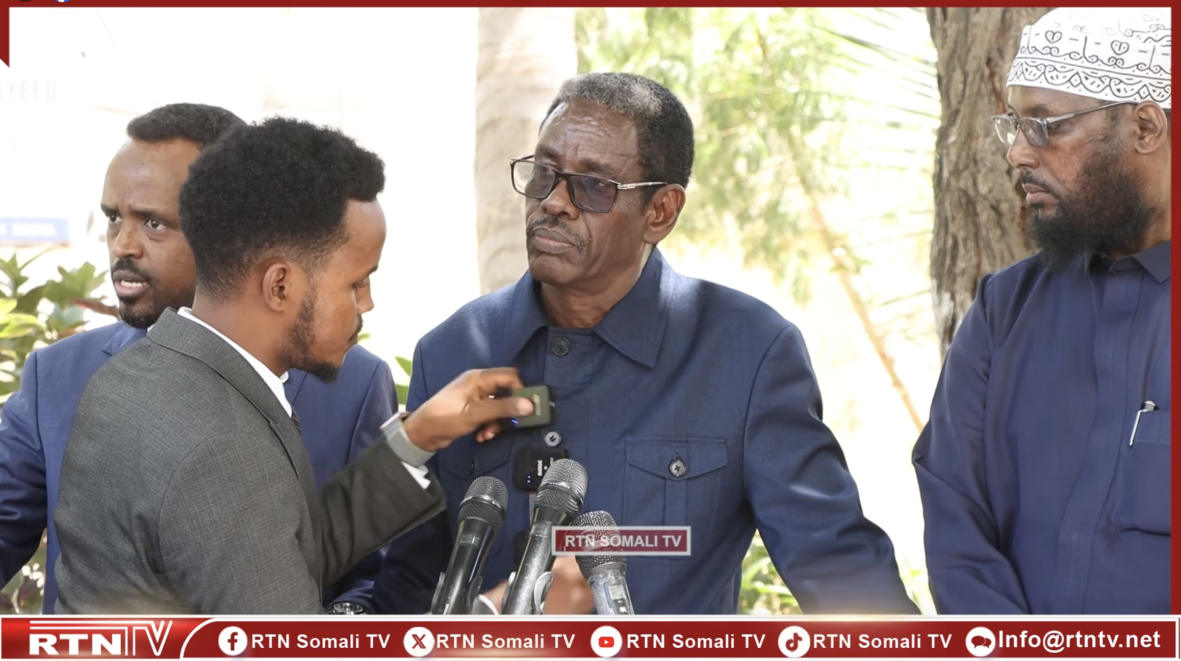 A security officer stepped forward, removed journalists' microphones from the podium, and cut off the recording. | PHOTO/Screengrab from RTN TV video clip.